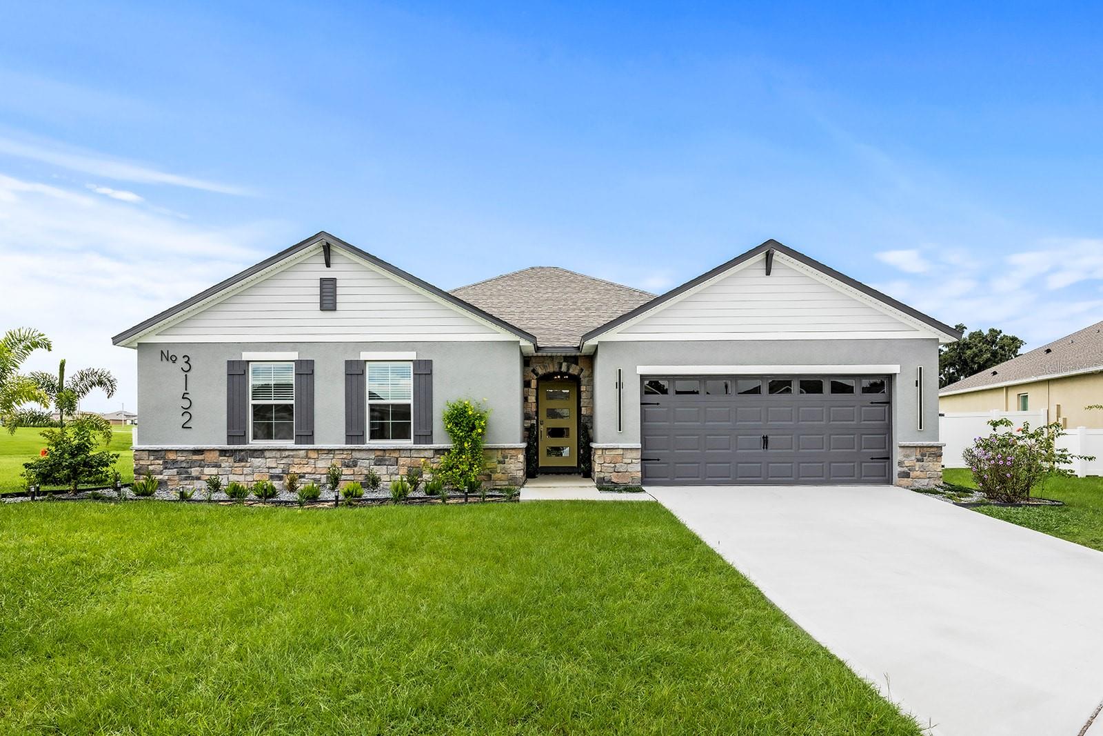 This stunning, newly built 2024 home offers modern updates throughout, starting with the front door and continuing into every detail. The home features 4 spacious bedrooms and 2 beautifully designed bathrooms. Upon entering, you'll notice a custom wall in the entryway, setting the tone for the high-quality craftsmanship found throughout the property. All interior doors have been updated with new hardware, adding a sleek, contemporary touch. Tile flooring runs through the main areas of the home, while the bedrooms provide the warmth and comfort of carpeting. The dining and living rooms boast custom accent walls, creating a unique and inviting atmosphere. The kitchen has been upgraded with a stylish backsplash and features beautiful, modern hardware on the cabinets, adding to the overall elegance of the space. At the back of the home, you'll find a lanai perfect for outdoor relaxation, with no back neighbors for added privacy. Situated on a quiet cul-de-sac, this home offers both serenity and convenience in a desirable location.