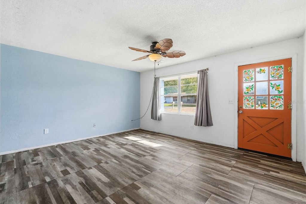 Photo of 205 E Holly Drive, Orange City, FL 32763 (MLS # FC314820)