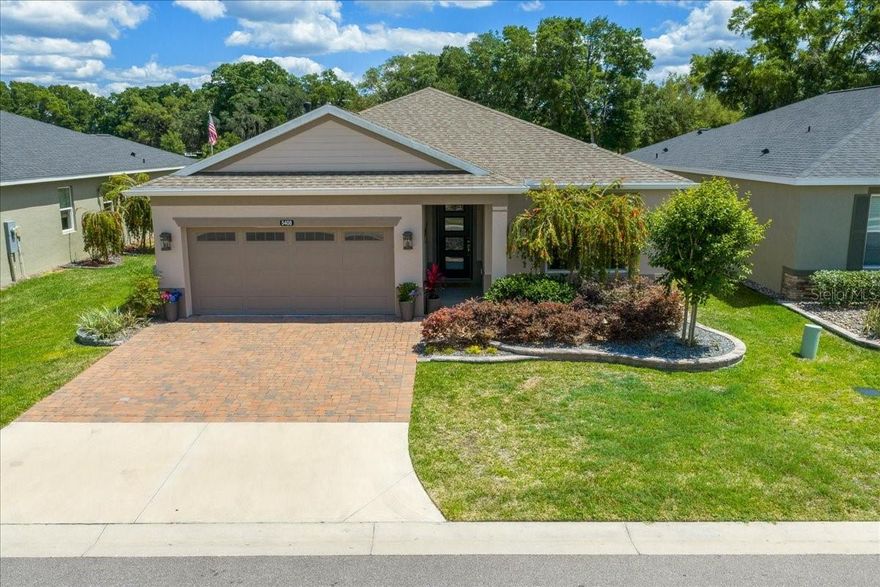OFFERED FULLY FURNISHED. This elegant and meticulously maintained, custom-built Connect model by Shea Homes offers a truly exceptional setting within one of Ocala’s most desirable communities. Positioned on a rare, private homesite with no rear neighbors, this property captures peaceful views of mature live oaks, walking trails, and the golf course beyond. Well-appointed furnishings create a true showcase designer home. 
Located inside the gated community of Ocala Preserve—just minutes from the renowned World Equestrian Center—this home delivers the perfect balance of luxury, lifestyle, and convenience.
Featuring 1,894 square feet of luxury living with 3 bedrooms, 2 bathrooms, a 2-car garage, and a dedicated flex room/office, the layout is both functional and refined. Upon entry, upgraded ceramic tile flooring and a thoughtfully designed split floor plan lead into a bright, open-concept living space filled with natural light and tranquil views.
The chef’s kitchen serves as the centerpiece of the home, showcasing an oversized island, quartz countertops, custom solid wood cabinetry, stainless steel appliances, and a gas range—ideal for both everyday living and entertaining.
With over $60,000 in upgrades, this home stands apart, including an extended brick-paver lanai with birdcage enclosure—perfect for enjoying Florida’s outdoor lifestyle in comfort and privacy.
Large windows throughout the home enhance the light, airy atmosphere while framing the serene outdoor setting leading to the lanai featuring an enclosed bird cage. The primary suite offers a peaceful retreat with views of the backyard and golf course, complemented by an ensuite bath featuring dual vanities, quartz countertops, a beautifully tiled walk-in shower with glass enclosure, Toto bidet, and a spacious custom walk-in closet.
Additional features include professionally designed landscaping, water softener systems, epoxy-coated garage and entry flooring, solar-powered attic fan, 50-amp outlet for RV or EV charging, custom wall paneling in the flex room/office, and upgraded finishes throughout.
Residents of Ocala Preserve enjoy a resort-style, amenity-rich lifestyle. The HOA includes lawn and landscape maintenance, high-speed fiber-optic internet, and access to world-class amenities: An 18-hole golf course, indoor and outdoor fitness centers, group classes, over 21 miles of scenic walking and biking trails, pickleball, tennis, bocce, horseshoes, a fishing dock, and water activities. The community also features a clubhouse, course, the popular Salted Brick restaurant, and an on-site spa.
This is a rare opportunity to own a thoughtfully upgraded home in a private, premium setting within one of Ocala’s most sought-after resort-style communities.
.