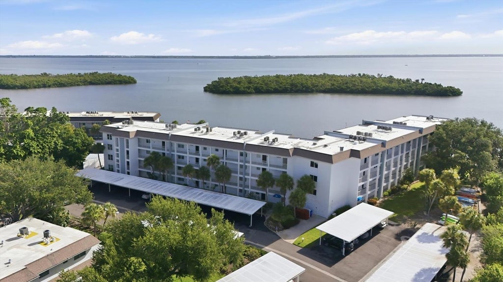Photo of 605 Sutton Place #101, Longboat Key, FL 34228 (MLS # A4709101)