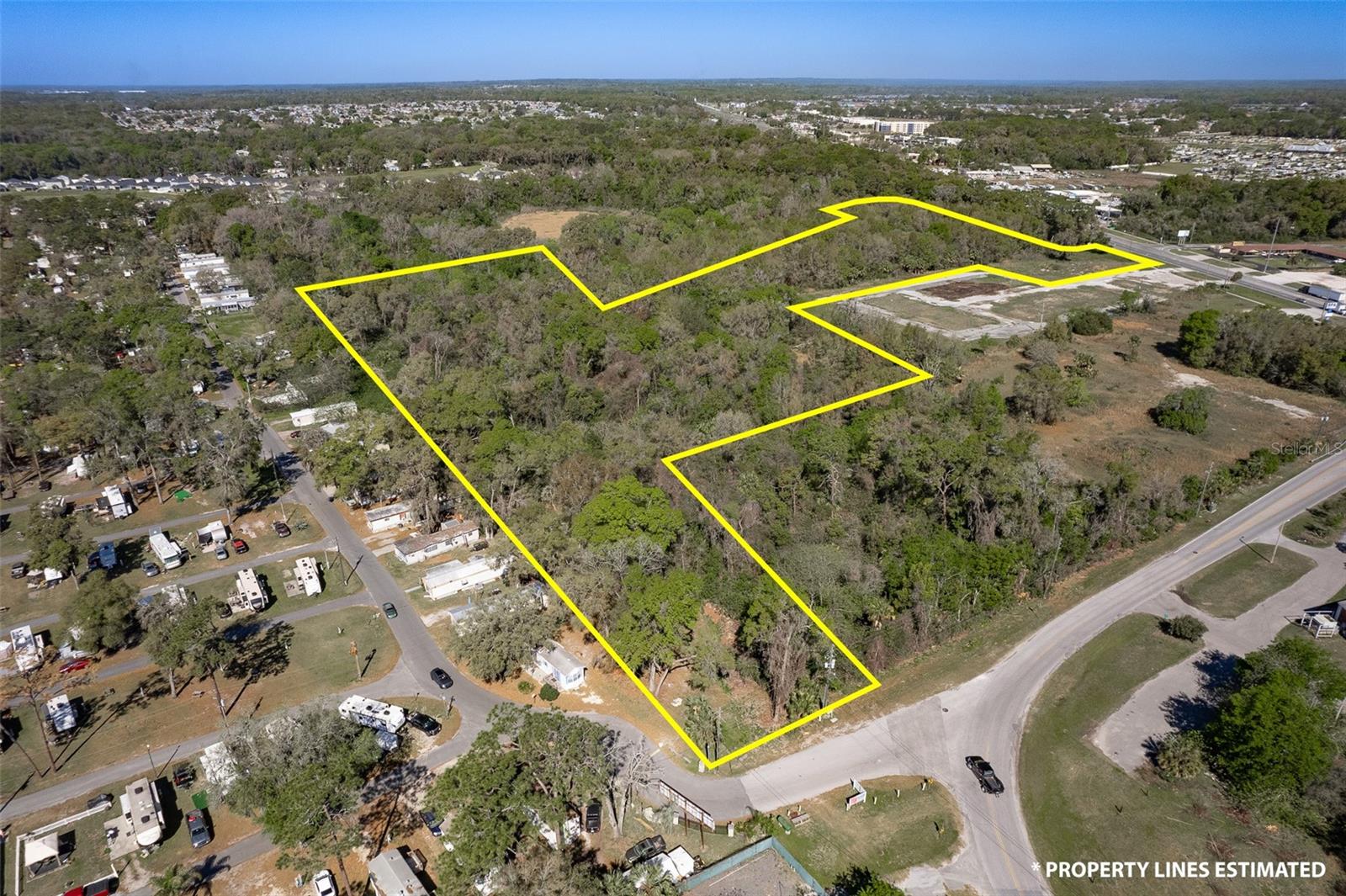 Don't miss out on this prime commercial land! Hwy 27 Frontage 1/5 Mile west of I-75 on south side. With 16.67 acres and its strategic location, this property offers endless possibilities for development . Big box retailer, shopping center, national names , hotel belongs, mixed use, hospital belongs here. City water and sewer are readily available upon annexation, making it easy to get started on your plans. Located in Marion County, this property boasts B2 and B-4 zoning, providing flexibility for a variety of commercial uses. With 30,000 cars passing by on US Hwy 27 and a whopping 80,000 on I-75 daily, you can be sure your business will get plenty of exposure. The property offers 156 feet of frontage on US Hwy 27, opening up to a wide and commanding view of fronting and westbound traffic. A survey is available for your convenience. Additionally, the property is only 1/5 mile west of I-75, making it highly accessible. This property is an ideal location for apartment development, hotels, big-box commercial, medical facilities, and more. It is worth noting that the future UF Shands Hospital is now open at the the NE Quadrant of I-75 Exit #354 - Ocala's northernmost exit. The area is home to large communities like Trilogy Ocala Preserve, Ocala Palms, Quail Meadow, and Golden Ocala - all within 4 miles west of the property. World Equestrian Center 4 miles away. Horse themed welcome center belongs here for I-75 traffic. There is also a Publix shopping center 1/4 mile west, a Golds Gym, and other retail spaces. Lastly, large distribution centers of major companies like Fed Ex, Chewy, and Amazon are nearby. This property is truly a gem and a must-see for any business looking for a prime location to establish or expand their presence. Call today for one of the best commercial sites in Ocala