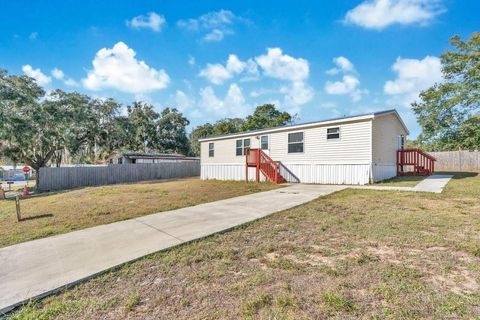 Photo of 17309 Palm Drive, Montverde, FL 34756 (MLS # S5140771)
