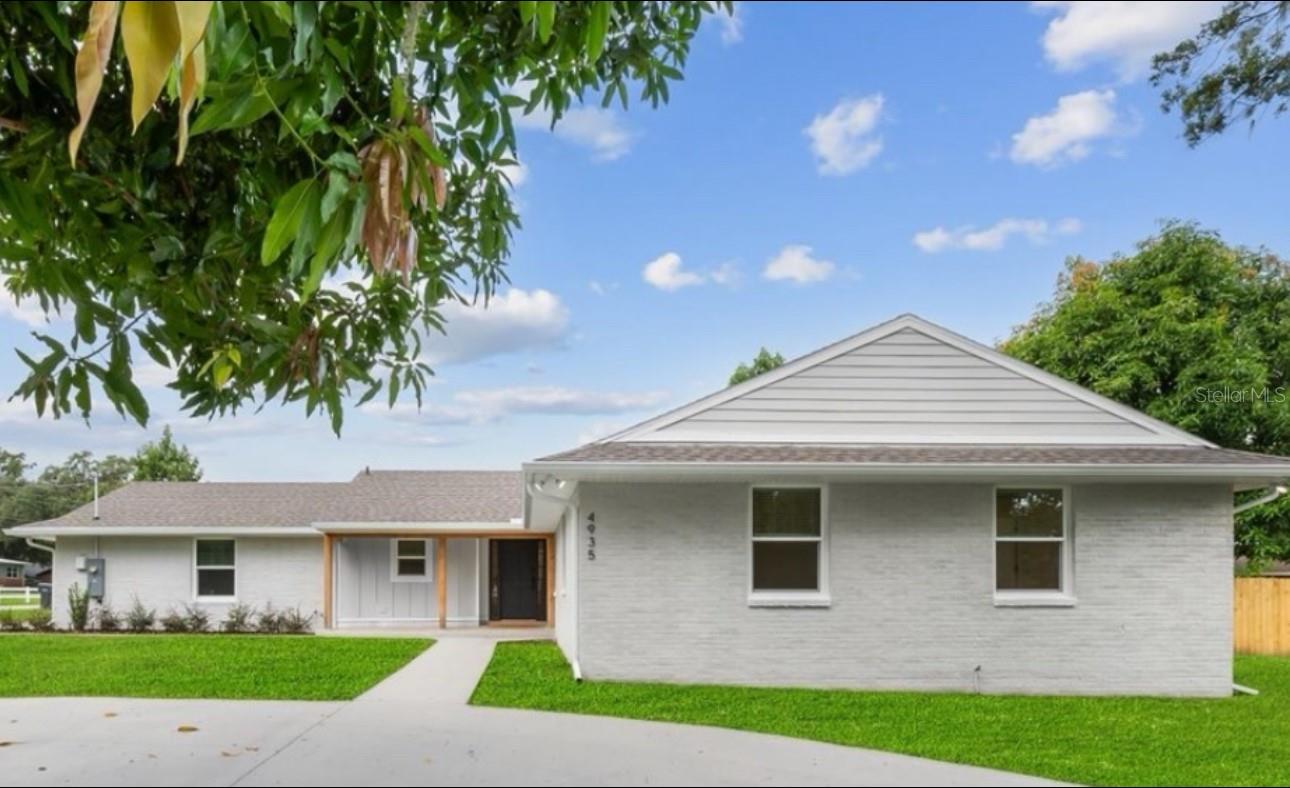 Completely Remodeled South Lakeland Beauty! This stunning 4-bedroom, 2-bath home sits proudly on a spacious corner lot of over a quarter acre in one of South Lakeland’s established neighborhoods. From the moment you arrive, the circular driveway, the front porch with newly installed gray pavers, and fresh curb appeal make a lasting impression.
Step inside to discover a complete top-to-bottom renovation where every detail has been thoughtfully designed. The home features luxury vinyl plank flooring throughout, creating a seamless and modern flow. The high-end kitchen is a true showpiece—featuring custom cabinetry, quartz countertops, premium black stainless appliances, and stylish designer finishes. Everything is brand new!
The open living areas are bright and inviting, perfect for entertaining or relaxing with family. Both bathrooms have been fully updated with contemporary tilework, modern fixtures, and elegant lighting.
Enjoy Florida living year-round in the rear screened lanai overlooking a large, newly fenced backyard—ideal for outdoor gatherings, pets, and play.
Located close to shopping, dining, schools, and with easy access to the Polk Parkway and I-4, this home combines luxury, location, and lifestyle in one perfect package.
Move-in ready and absolutely stunning—schedule your private tour today!
