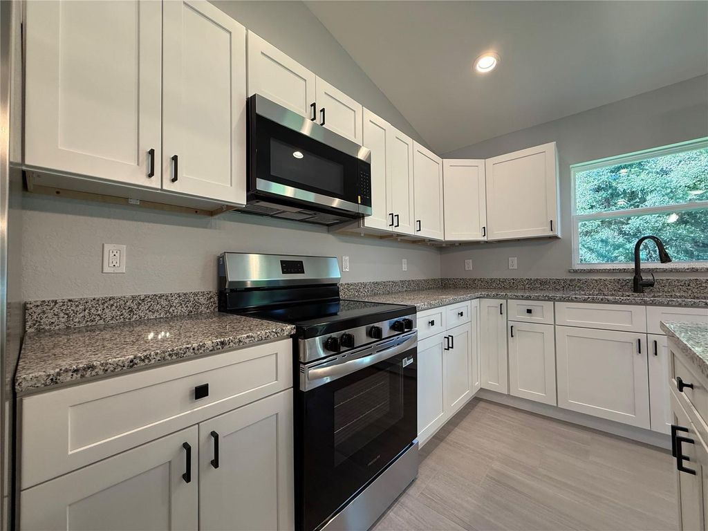 Photo of 205 Emerald Road, Ocala, FL 34472 (MLS # OM717853)