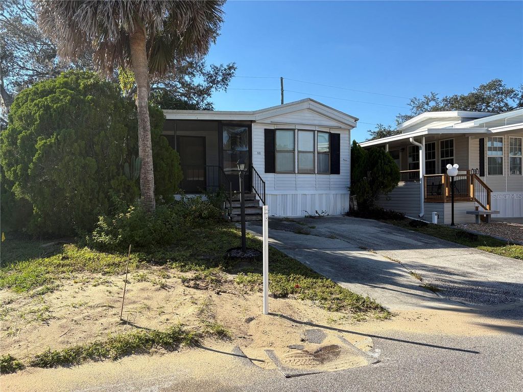 Photo of 11 Citrus Ridge Drive #11, Davenport, FL 33837 (MLS # TB8446399)