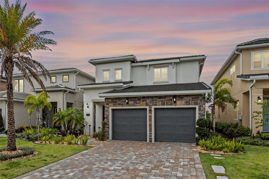 Welcome to the pinnacle of refined living in the exclusive gated community of Bella Collina. This distinguished 4-bedroom, 3.5-bath golf course residence showcases timeless features and tasteful upgrades throughout the dining room, kitchen, primary suite, and staircase. Upon entering, you’re greeted by an abundance of natural light, soaring ceilings, and upgraded luxury vinyl flooring that flows seamlessly throughout the home. The main living area features an open-concept design, seamlessly blending the family room, kitchen, and dining room—all offering stunning views of the golf course. The kitchen is a chef's dream, boasting shaker cabinetry, quartz countertops, a stylish backsplash, luxury appliances, a gas cooktop, and ample space for all your culinary needs. The dining room comfortably accommodates eight, perfect for entertaining friends or enjoying family meals. The primary suite, conveniently located on the first floor, offers a spacious retreat with a walk-in closet, built-in features, and a spa-like ensuite with dual vanities, upgraded countertops, a soaking tub, and a large walk-in shower with a rain feature. Ascend the beautifully designed staircase to discover a large loft with built in custom features, three additional bedrooms, and two more bathrooms, including one bedroom with an ensuite. All bedrooms feature fully built walk-in closets. Outdoor living is taken to new heights with a fully custom outdoor kitchen, with a size able back yard big enough for a pool and is already fully fenced. The Club at Bella Collina offers upscale amenities, including spa facilities, a full-service fitness center, and a member-exclusive restaurant serving breakfast, lunch, and dinner daily. Nestled between Lake Apopka and Bella Collina’s own spring-fed Lake Siena, the Sir Nick Faldo-designed championship golf course boasts impressive views with dramatic elevation changes and undulating greens. Located just a short drive from the magic of Disney, the vibrant atmosphere of International Drive, and premier shopping at Millennia Mall, this home offers convenience paired with quality. Montverde Academy, a world-class educational institution known for its commitment to academic excellence, is also less than three miles away. Discover the perfect blend of sophistication and functionality in this meticulously crafted home, offering both comfort and style. Schedule a private viewing today and make this your retreat in the heart of convenience.