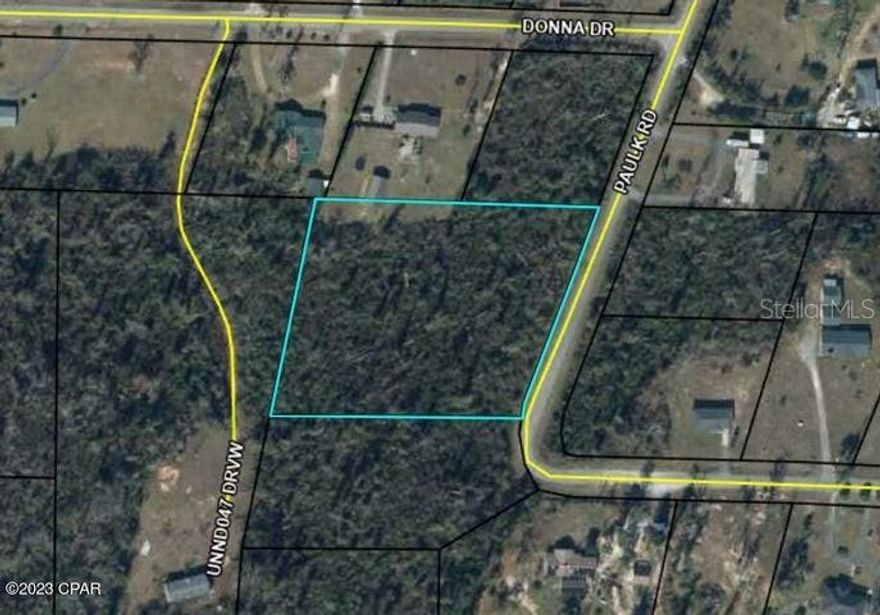 HUGE PRICE REDUCTION. Buildable wooded acres close to schools, shopping and restaurants. Property has already been surveyed into 3 separate parcels. Excellent opportunity to invest or build your dream home.
