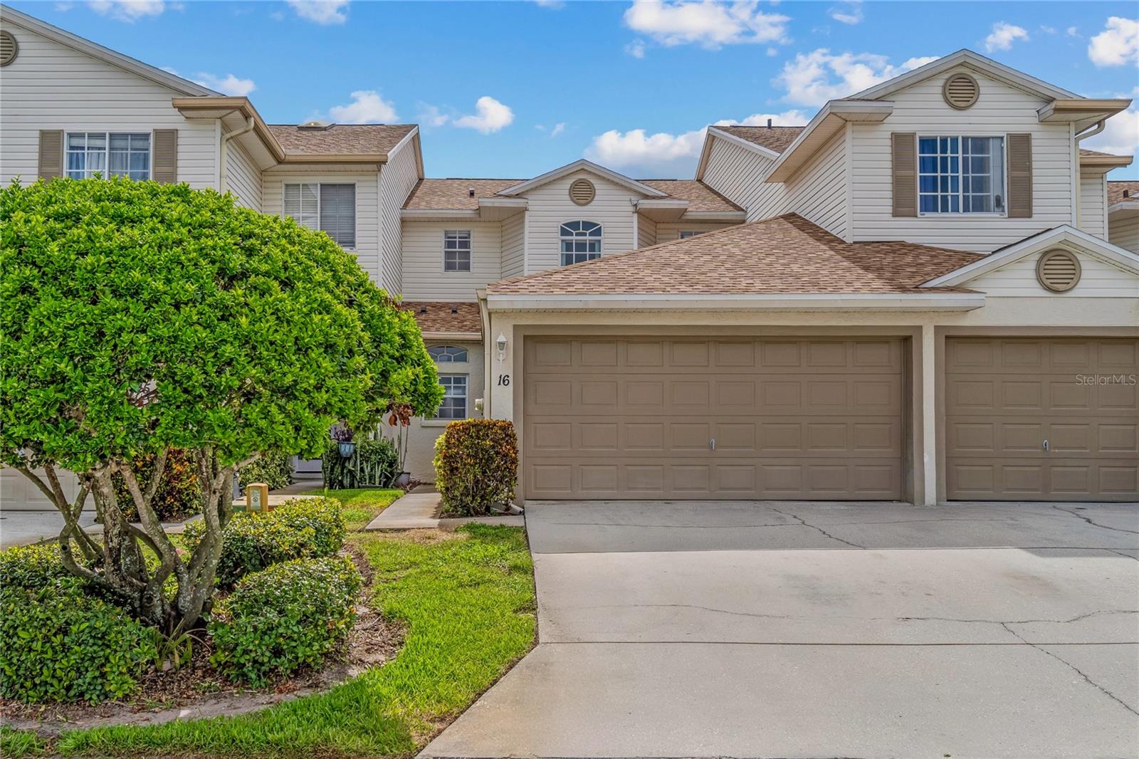 Discover your perfect retreat in the charming Kenneth City neighborhood, where small-town warmth meets big-city convenience. This delightful 3-bedroom, 2.5-bathroom townhome welcomes you with 1,613 square feet of thoughtfully designed living space that feels both spacious and wonderfully cozy. The heart of this home features an inviting living area that flows seamlessly throughout the main floor, while the primary bedroom sits conveniently downstairs for those who appreciate single-level living. Venture upstairs to find two additional bedrooms and a versatile loft area that's just waiting for your creative touch – whether you envision a home office, playroom, or that hobby space you've been dreaming about. The well-appointed kitchen offers ample counter space for culinary adventures, while the screened-in patio provides your own private escape for morning coffee or evening relaxation. With a 2-car garage protecting your vehicles and a recently replaced air conditioning system from 2023, comfort and convenience are built right in. Kenneth City's prime location puts you within easy reach of quality schools like nearby Hollins High School, convenient public transportation, and essential shopping at Publix and Sprouts. When you need to unwind, James P. Ernst Park offers green space for outdoor activities. The community pool adds that extra touch of resort-style living right in your backyard. This well-maintained townhome represents exceptional value in today's market, offering move-in ready comfort in one of the area's most desirable neighborhoods. Sometimes the best things really do come in perfectly sized packages. Roof 2024. AC 2023, Water Heater 2003, Electrical Panel - 2003