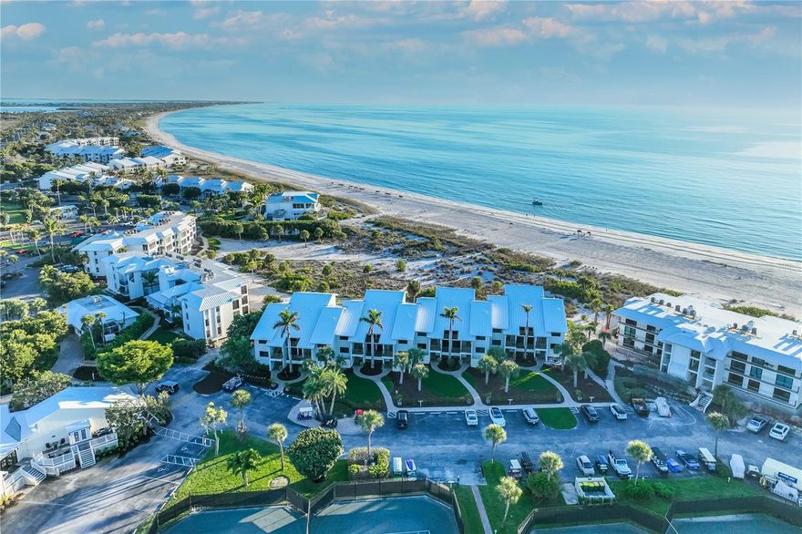 Situated within the exclusive, gated, Gulf-front Boca Grande Club, this beautifully positioned 2-bedroom, 2-bath residence offers 1,183 square feet of refined coastal living. Residents enjoy a premier amenity collection including private beach access, multiple resort-style pools, Har-Tru tennis courts with pro shop and instruction, a state-of-the-art fitness center, clubhouse dining and tiki bar, golf cart/vehicle charging station, and 24-hour security, delivering a truly elevated island lifestyle.

Ideal as a seasonal escape or full-time residence, this low-maintenance first-floor end unit is just moments from Boca Grande’s charming village, renowned fishing, boating, and dining. Its coveted walk-out location provides effortless access to the beach, placing the Gulf shoreline only steps from your door.

The building is scheduled for a striking transformation this summer, featuring white impact-rated windows throughout, new Gulf-side sliding glass doors opening to the screened porch, sleek clear-glass modern safety railings, and magnetic roll-down electric screens. The Gulf-facing window in the primary suite will be dramatically expanded to over eight feet wide, extending from floor level to just inches below the ceiling, framing breathtaking water views and filling the space with natural light. Upon completion, the building will be further enhanced with fresh exterior paint and upgraded landscaping.

Looking ahead to 2026, the Boca Grande Club anticipates unveiling additional community enhancements designed to further elevate the resident experience. With a nearly 20-year waitlist for social membership, this offering represents a rare opportunity to acquire a two-bedroom residence within one of Boca Grande’s most established and desirable Gulf-front communities, at exceptional value ahead of future pricing growth.