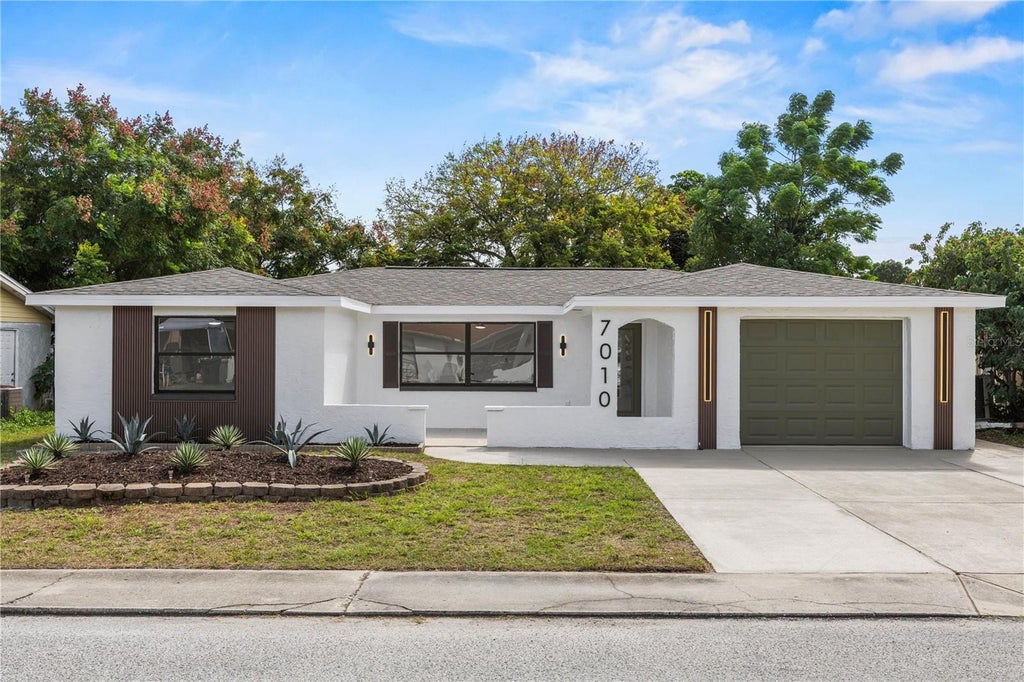 Photo of 7010 Parrot Drive, Port Richey, FL 34668 (MLS # W7890126)