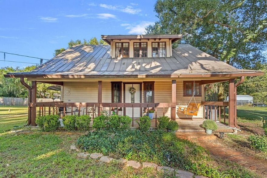 A Home with a Story to Tell - Built in the 1930s, this Craftsman-style home is a cherished piece of Minneola’s history. Local lore suggests it once housed the town's Postmaster, nurse, and even a pastor—making it a true community landmark.
Inside, original hardwood floors, beadboard ceilings, and intricate woodwork showcase the home’s enduring character, while thoughtful updates ensure comfort for today’s living. A modern kitchen, new central heating and air (2025), and a durable metal roof bring peace of mind. The flexible bonus room has been enhanced with closet space, creating a primary retreat that easily fits a king-size bed.
Enjoy coffee on the welcoming front porch or entertain beneath the shade of mature oak trees in the spacious backyard. More than just a house, this is a lovingly preserved piece of Minneola’s past—ready for its next chapter. 
Conveniently located near Historic Downtown Clermont and Minneola’s growth corridor, this home is perfect for those who love history, character, and community.  If you’re seeking a home that blends timeless character with modern updates, you’ll want to see this one.