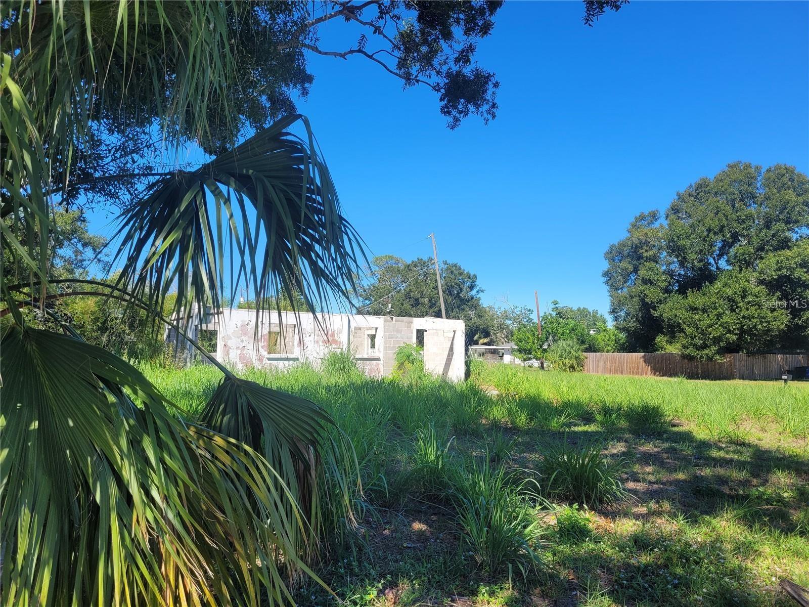 Build your dream home in a heart of Sarasota on this large corner city lot of 0.24 acre with utilities! Slab walls and footings from previous home are on site. Maximum square footage under roof that can be built is 3,659 square feet according county letter. 30 new clumping bamboo plants have been planted along Western lot line. New fence is recently installed on West lot line. Survey is available. No HOA, no flood zone, come and enjoy your Florida living!