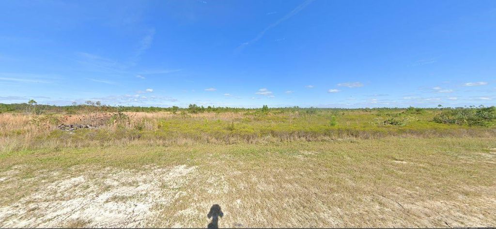 Photo of 424 Portulaca Drive, Indian Lake Estates, FL 33855 (MLS # O6229116)