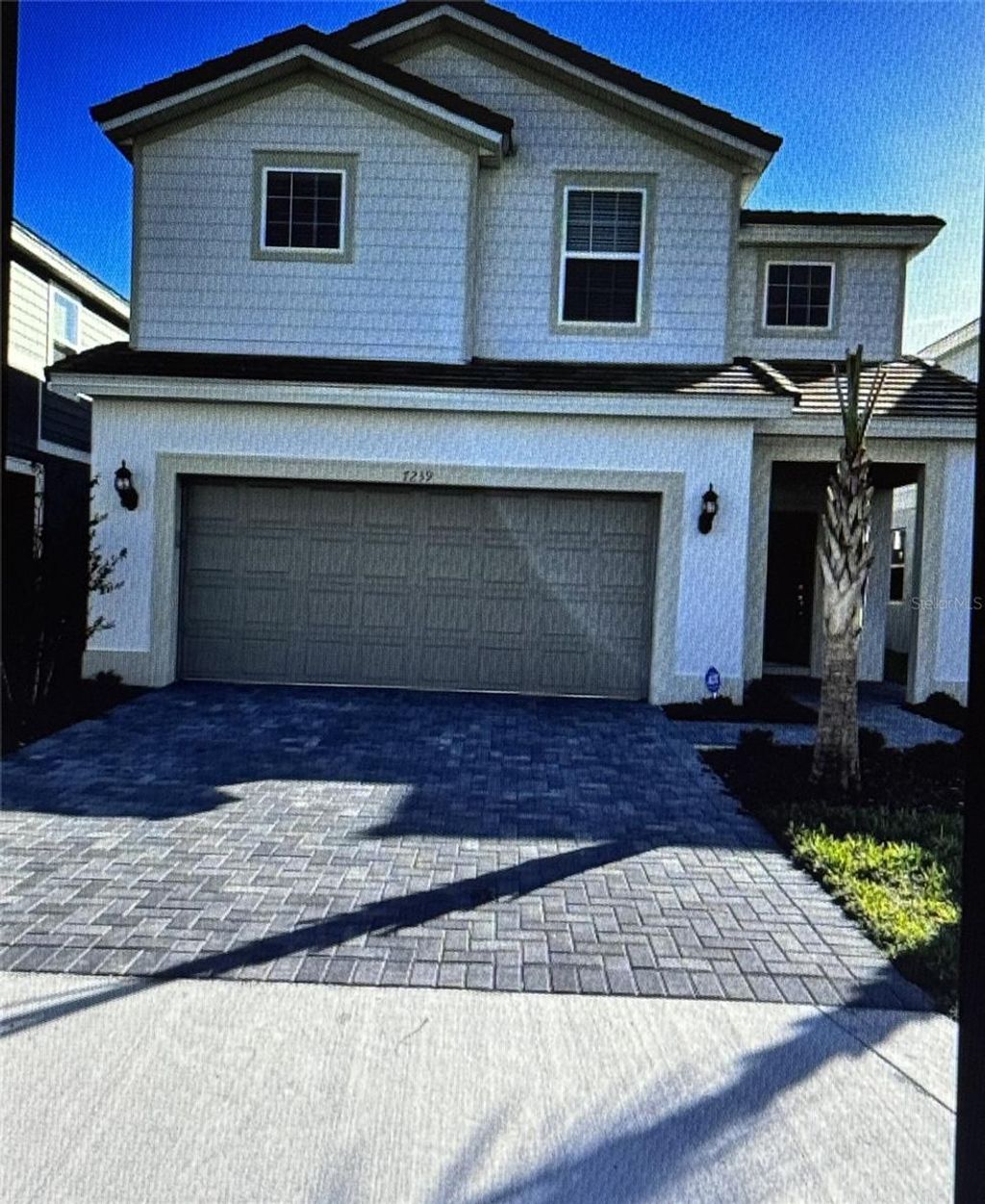 Photo of 7239 Oakmoss Loop, Davenport, FL 33837 (MLS # S5145109)