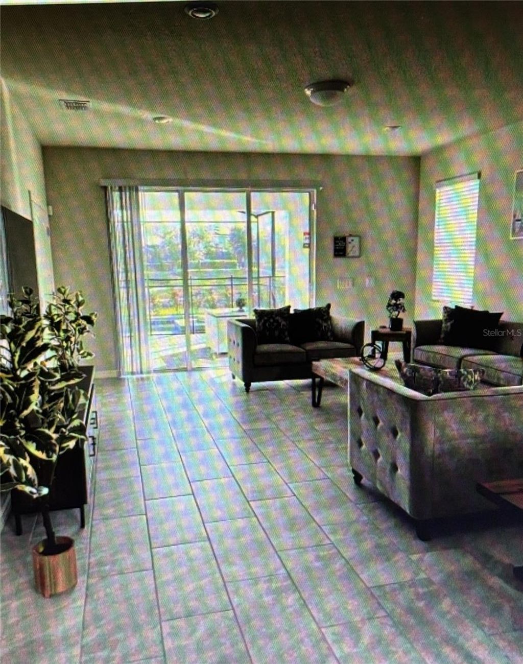 Photo of 7239 Oakmoss Loop, Davenport, FL 33837 (MLS # S5145109)