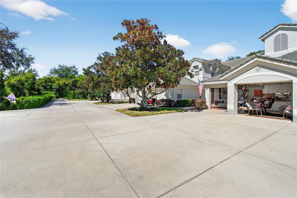 Photo of 516 Grasslands Village Circle, Lakeland, FL 33803 (MLS # P4936764)
