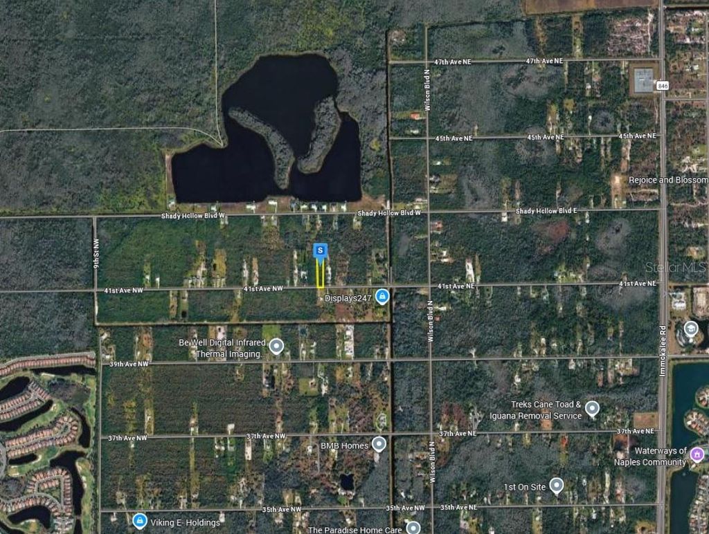 Photo of 265 41st Ave NW, Naples, FL 34120 (MLS # A4685952)