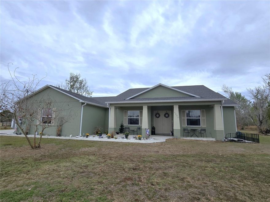 4 Bedroom 3 Bath home situated on nearly 3 acres of country living only minutes away from I-4 (Tampa/Orlando). Built in 2020 this home features 10’ ceilings, an open concept living area, and a cozy Den with a barn door for added character. The Kitchen boasts granite counter tops, Samsung appliances, a walk-in pantry with lots of storage and a large island bar for ample seating. The 3 way split floor plan includes ensuite baths with granite counter tops in the Primary Bedroom and Bedroom 3, walk in closets, a large screened Patio with hot tub, an oversized 3 car Garage and a detached 18 x 20 Workshop. Plenty of guest parking with a long driveway. As an added bonus, this home features a newer 49-panel solar system(2024) with three backup batteries for comfortable, worry free living during a power outage.  So many great features, call to make an appointment today!