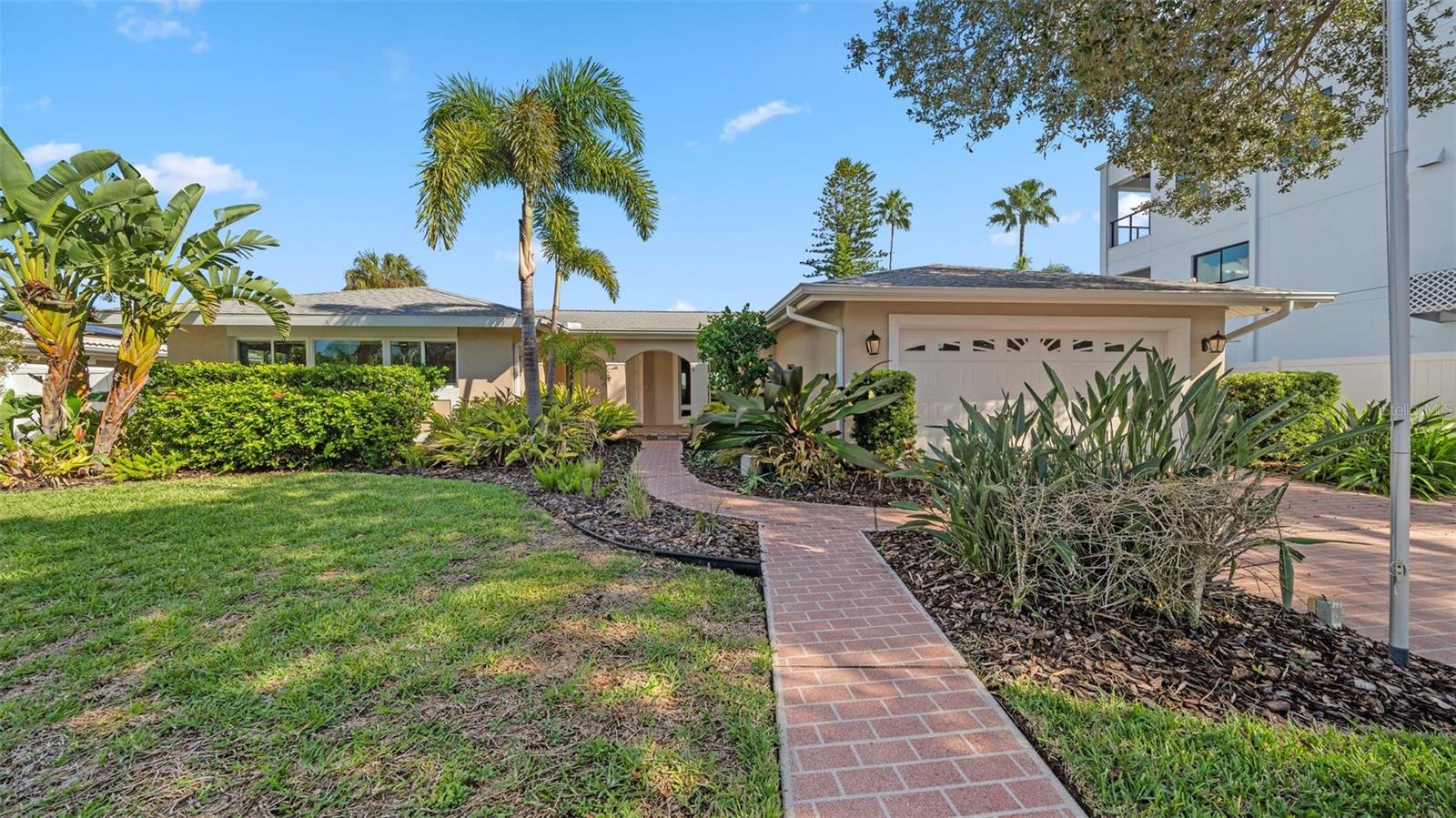 One or more photo(s) has been virtually staged. Welcome to coastal living at its finest! This meticulously maintained residence on Windward Island in Clearwater, FL, invites you to experience the epitome of luxury in a tranquil beachside haven.
Key Features:
THREE BEDROOMS!
Unwind in the lap of luxury with three beautifully appointed bedrooms, each designed for comfort and style. Wake up to the gentle sea breeze and natural light streaming through the windows, offering a seamless connection to the surrounding beauty.
TILE FLOORING AND STONE COUNTERTOPS:
With timeless appeal, tile flooring and stone countertops offer both durability and aesthetic charm.
GORGEOUS WATER VIEWS:
Savor breathtaking vistas of the shimmering water from the comfort of your home.
PRIVATE WATERFRONT OASIS:
A large dock with a boat lift and two jet ski lifts beckons water enthusiasts, providing direct access to the intercoastal and Gulf.
OPEN FLOOR PLAN FOR EFFORTLESS ENTERTAINING:
The open floor plan seamlessly creates an inviting space for gatherings with family and friends.
OCEANSIDE LIVING IN A QUIET NEIGHBORHOOD:
Nestled in a serene and quiet neighborhood, this home offers the perfect balance of relaxation and convenience, embodying the essence of coastal living.
LUSH LANDSCAPING:
The well-manicured landscaping enhances the curb appeal and surrounds your residence with a sense of natural beauty and serenity.
LUXURY LIVING WITHOUT HOA OR CDD:
Enjoy the freedom of luxury living without the constraints of HOA fees or CDD assessments.
From the warm and inviting interiors to the peaceful waterfront setting, this home is not one to miss!