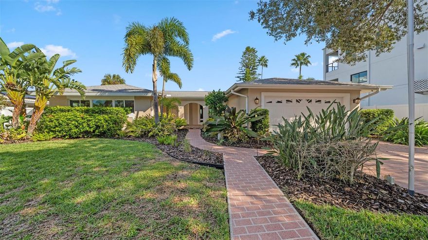 One or more photo(s) has been virtually staged. Welcome to coastal living at its finest! This meticulously maintained residence on Windward Island in Clearwater, FL, invites you to experience the epitome of luxury in a tranquil beachside haven.
Key Features:
THREE BEDROOMS!
Unwind in the lap of luxury with three beautifully appointed bedrooms, each designed for comfort and style. Wake up to the gentle sea breeze and natural light streaming through the windows, offering a seamless connection to the surrounding beauty.

TILE FLOORING AND STONE COUNTERTOPS:
With timeless appeal, tile flooring and stone countertops offer both durability and aesthetic charm.

GORGEOUS WATER VIEWS:
Savor breathtaking vistas of the shimmering water from the comfort of your home.

PRIVATE WATERFRONT OASIS:
A large dock with a boat lift and two jet ski lifts beckons water enthusiasts, providing direct access to the intercoastal and Gulf.

OPEN FLOOR PLAN FOR EFFORTLESS ENTERTAINING:
The open floor plan seamlessly creates an inviting space for gatherings with family and friends.

OCEANSIDE LIVING IN A QUIET NEIGHBORHOOD:
Nestled in a serene and quiet neighborhood, this home offers the perfect balance of relaxation and convenience, embodying the essence of coastal living.

LUSH LANDSCAPING:
The well-manicured landscaping enhances the curb appeal and surrounds your residence with a sense of natural beauty and serenity.

LUXURY LIVING WITHOUT HOA OR CDD:
Enjoy the freedom of luxury living without the constraints of HOA fees or CDD assessments.

From the warm and inviting interiors to the peaceful waterfront setting, this home is not one to miss!
