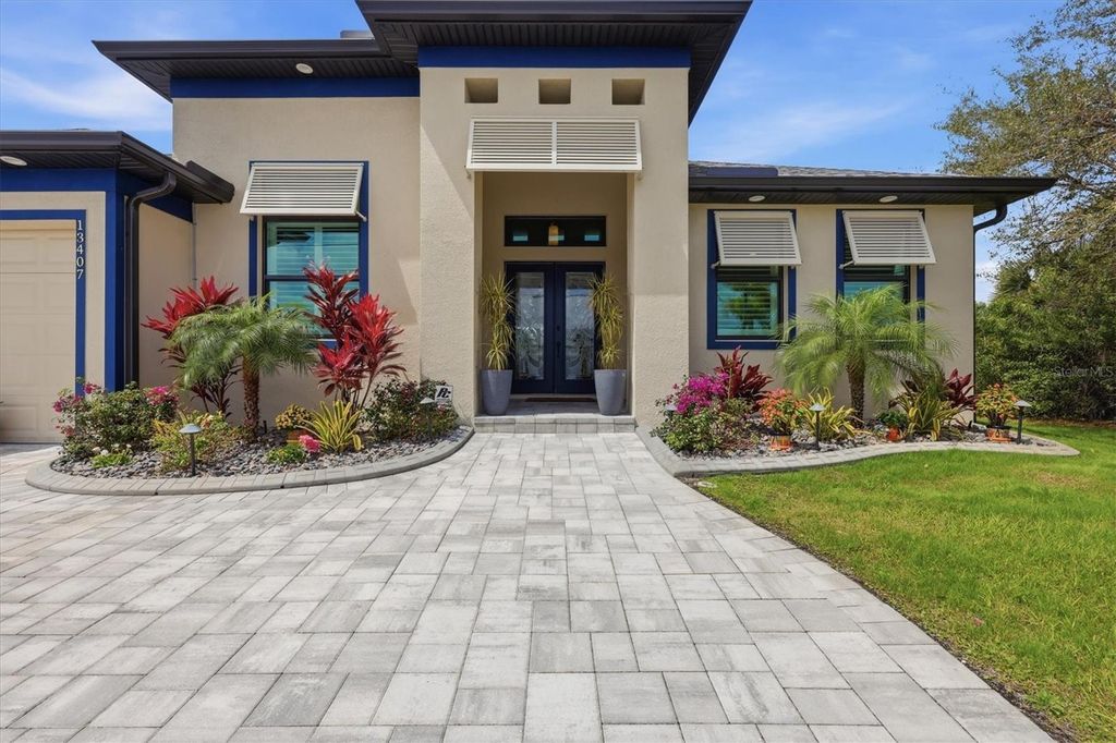 Photo of 13407 Chenille Drive, Port Charlotte, FL 33981 (MLS # TB8487098)