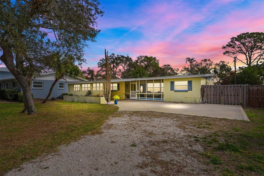 WELCOME HOME!   This simply CHARMING 3 bedroom 2 bath Ranch style BLOCK home is located in the HIGHLY SOUGHT AFTER Rio Vista area of Holly Hill with RIVER VIEWS on an OVERSIZED LOT!   This gem features a flexible layout no matter if you prefer indoor or outdoor living - this home has you covered!  Enjoy SUNRISE/SUNSET views from the SUNDECK facing the HALIFAX RIVER; that's just a 2 minute walk away.  NO FLOOD ZONE and NO HOA.  This home is LIGHT and BRIGHT with an Open kitchen concept and separate dining area making it ideal not just for cooking, but for conversing with friends and family at the same time.  UPDATED KITCHEN including Corian countertops and appliances done in (2024).  Kitchen boasts plenty of counter space for cooking and storage as well.  Third bedroom shares an adjoining door with the Primary Bathroom making it easily used as a Dressing Room, Nursery, Crafting room or more.  You can also choose to keep it locked for your privacy.....the possibilities are endless but the choice is yours!   Other great attributes of the home not to be missed include: UPDATED FLOORING, NEW ROOF (10/2023), UPDATED ELECTRIC (2023), NEW A/C (2021), Indoor laundry located off Primary bathroom, and the Florida room has been enclosed as an addition with a separate wall A/C unit leading to the expansive backyard that has plenty of room for a pool, fire pit or even planting a garden complete with an OUTDOOR SHOWER.   FULLY FENCED Backyard for privacy with a wide entrance so you can easily store your BOAT or RV.  Also INCLUDED is the WASHER DRYER.  Furniture is negotiable/Possible Turnkey  Golfcart may be able to be purchased separately.  Home passed Insurance 4 Point and Wind Mitigation (2023).  Conveniently located near Riviera Park, the Halifax River, boat ramps, shopping, schools, hospitals, beaches (JUST 7 MINUTES AWAY) , biking/nature trails, and minutes from I-4, the International Speedway, as well as area attractions like Disney, Universal Studios and more!  Multiple airports nearby making it convenient for visiting family and friends.  Don't delay...Call your agent and BOOK A SHOWING TODAY!