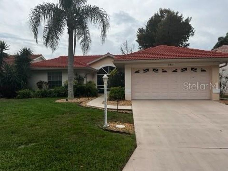 Short Sale. 2-bedroom, 2-bath home ideally situated on a peaceful pond in the highly sought-after gated community of Oyster Creek. Enter through the screened foyer and enjoy direct views through the great room and lanai to the water beyond.

The home features volume ceilings and two sets of triple sliding glass doors that open to a spacious screened lanai—perfect for relaxing and taking in the surrounding wildlife.

The primary suite offers a large walk-in closet and a walk-in shower. The kitchen provides ample cabinet and counter space, along with a convenient breakfast bar.

Located within walking distance to the clubhouse, pool and spa, fitness center, library, bocce ball, and tennis courts. Just minutes to shopping, dining, and the beach.

This property presents a great opportunity for a buyer to update and customize to their own taste.