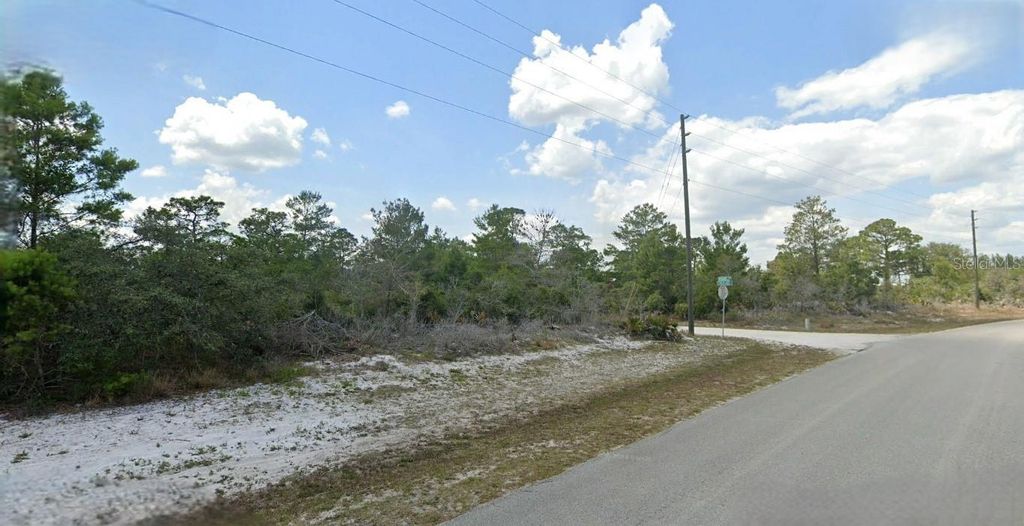Photo of 1162 Wildflower Street, Lake Placid, FL 33852 (MLS # O6337681)