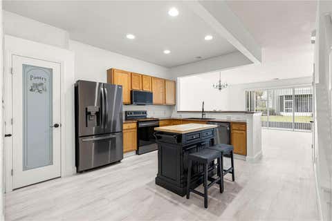 Tiny photo for 4131 SW 51st Circle, Ocala, FL 34474 (MLS # OM729582)