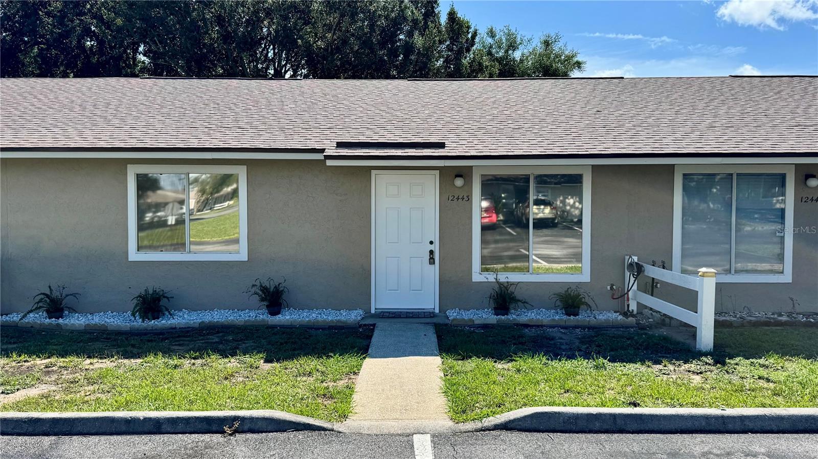Welcome Home to Tavares Ridge! This like new 2/2 condo has been completely renovated and has no rear neighbors! The kitchen features all new wood cabinets, new counter tops and brand new SS appliances! It also boasts a large walk-in pantry! The large Living/Dining Room combo provides plenty of room for all of your furniture and entertaining needs. The spacious primary bedroom has a large walk-in closet and sliding doors that access the newly renovated screened-in lanai. The primary bathroom has been fully renovated with an all new vanity, dual sinks, toilet and new fixtures! The second bedroom is also a good size and is located next to the fully renovated second bathroom. All new beautiful luxury vinyl plank flooring has been installed throughout the condo. You'll love spending time out on the 10x21 screened-in back porch! With no condo's directly behind you, you will benefit from plenty of back yard space and privacy! Other upgrades include all new interior paint, all new light fixtures, new remote controlled ceiling fans and new electrical panel! In addition, the association recently painted the exterior and installed a new roof! Enjoy the benefit of having a fenced in community pool during those hot summer days! In addition to being located just minutes from Downtown Tavares, you will have easy access to all of your shopping and dining needs! All buyers must be approved by the condo association prior to closing.