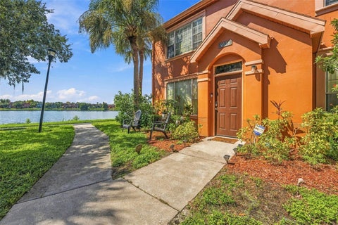 Photo of 9138 Lake Chase Island Way, Tampa, FL 33626 (MLS # TB8547932)