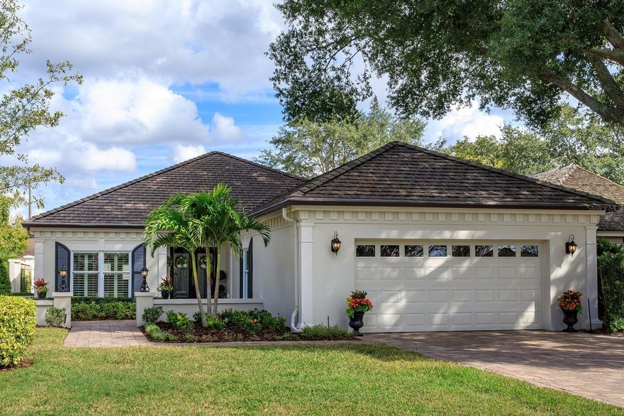 Multiple offers, highest and best. accepted by 12/6/2023 by 3: PM. Come savor the unique qualities of this remarkable home in Bay Hill Village! Occupying a beautiful corner lot, this desirable 2 bedroom, 2.5 bath home consists of 2,771 square feet, plus an extensive paved patio. The interior’s neutral palette blends timeless luxury with practical features. It offers spacious rooms; 7’ high doorways; plantation shutters; abundant storage; & exquisite custom millwork throughout! Its thoughtful design encourages easy movement overall. Ensuite Bathrooms, Kitchen, Laundry, Wet Bar, & Hallway all have Custom Solid Maple Cabinets. Spacious Primary Bedroom includes professionally designed walk-in closet w/built ins. Its Spa-like Bathroom features ample storage along with Steam Room Shower w/ built in Bench, & Drench Shower; Custom Sauna; Kohler Pedestal Sinks and private Kohler water closet & bidet. The airy 2nd Bedroom also has a walk-in closet & Ensuite Bathroom which highlights Kohler products. An elegant, Custom Paneled Den epitomizes comfort/luxe to enjoy your favorite TV programs, or relish as a quiet enclave. You’ll love the generous, well-equipped Kitchen with its Built-In Appliances; Fabulous  Storage & many other features including a Large Breakfast Nook! Adjacent to the kitchen, the Family/Living Room provides plenty of space for friends & family to gather and has a custom bar height serving counter, convenient to the Wet Bar & Sub Zero Wine Cooler. Double pocket doors lead into an inviting sunroom which makes a perfect home office or comfy flex space opening out to the patio. RECENT HOME IMPROVEMENTS INCLUDE: Tile Roof; Gutters w/Gutter Helmets-2014;Driveway Pavers-2016; Low e Windows in entire home-2021; Exterior & majority of Interior Painted-2021.Trane 18 Seer A/C  with Smart Thermostat & All New Duct Work-2021. Water Heater serving Laundry & Primary Bath-2021. GE Microwave Oven-2021; Dacor 42” B/I Refrigerator-2022. Bay Hill Village amenities include a beautiful Clubhouse with Exercise Room as well as Pool, Hot Tub, and Tennis Courts. A rare gem, this Gated Community, home to 121 private residences, is adjacent to, and has a Private Access Gate leading to Bay Hill Country Club & Golf Course - site of the PGA Tour’s Arnold Palmer Invitational. (Membership not included). This quiet, but convenient, oasis is easily accessible to shopping, great schools, and medical facilities! Imagine just a couple minutes’ drive to Restaurant Row, easy commute to Orlando’s famous Attractions & 20 minutes to OIA! Whether you’re looking for a perfect winter retreat or fabulous year-round residence, you won’t be disappointed! Call now to reserve your private showing.