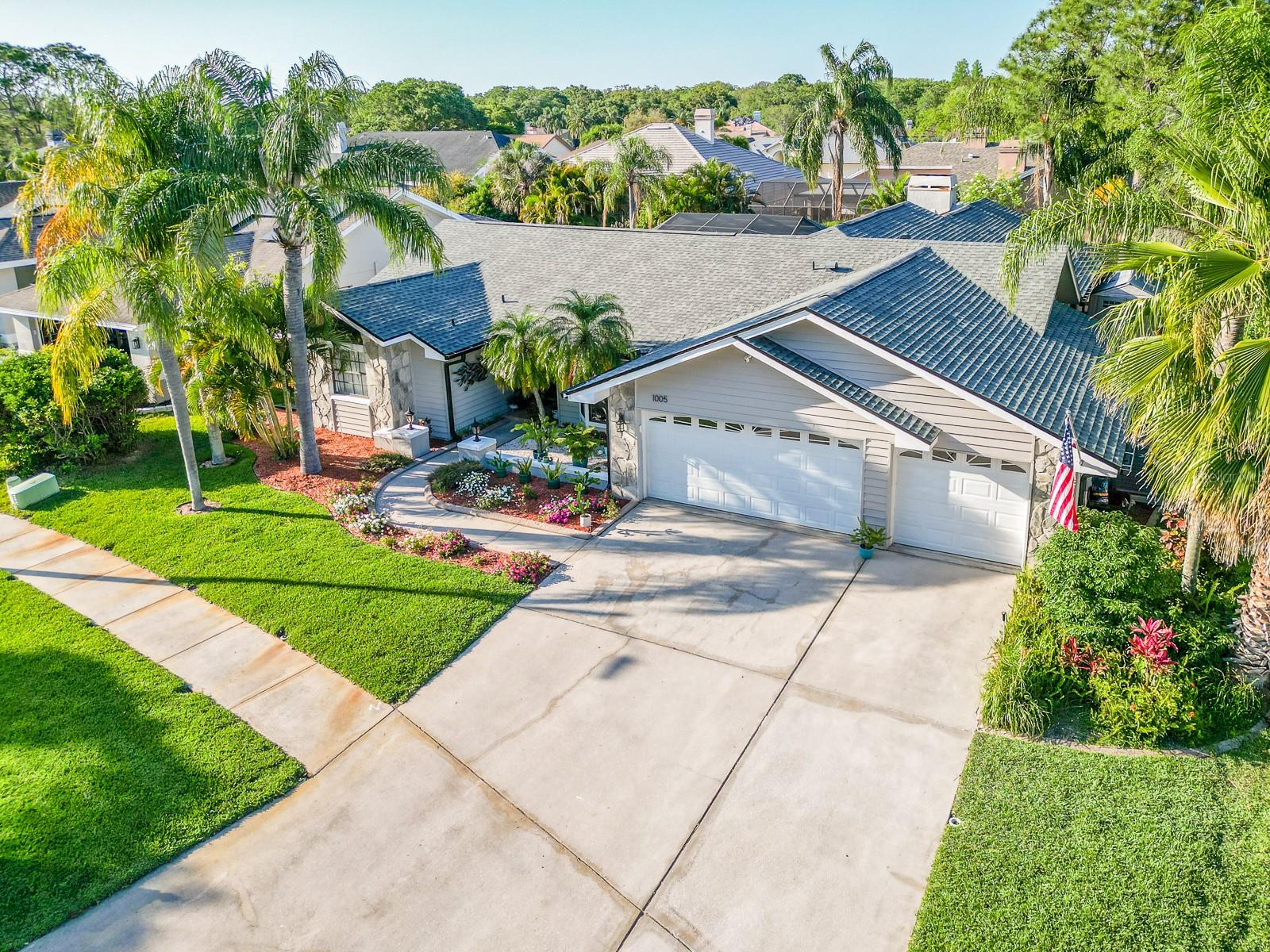 Breathtaking Safety Harbor retreat with heated saltwater pool and spa! Welcome to your dream home in the heart of Safety Harbor, located in the golf cart–friendly Huntington Trails community of Safety Harbor, where elegance, comfort, and the Florida lifestyle come together. The centerpiece of this home is the resort-style outdoor oasis featuring a heated saltwater pool, spa, and a spacious covered, screened lanai with Florida glass for added privacy, perfect for year-round relaxation and entertaining. Inside, the bright and airy open-concept layout showcases a chef’s kitchen with stone countertops, solid wood cabinetry, large center island, and a stainless farmhouse sink that flows seamlessly into the family room with a wood-burning fireplace. The luxurious master suite offers soaring ceilings, his-and-hers walk-in closets, private pool access, and a newly remodeled spa-inspired bathroom. Guests will love the private rear bedroom with its own bath and pool access, while two additional bedrooms and a shared guest bath provide plenty of space for family or visitors.
Recent upgrades include roof (2022), air handler (2022), water heater (2023), water softener (2024), dishwasher (2023), washer and dryer (2022), pool heat pump (2021), and flat roof resealed (2024). Just minutes from Safety Harbor Main Street, you can walk, bike, or ride your golf cart to waterfront parks, the pier, boutique shops, coffee houses, and beautiful trails along Tampa Bay.
This home is also close to top-rated schools, a community recreation center, baseball fields, brand-new pickleball courts, and offers easy access to Tampa International Airport, St. Pete–Clearwater Airport, Clearwater Beach, Honeymoon Island, and marinas. This is more than a home—it’s the Safety Harbor lifestyle at its finest!