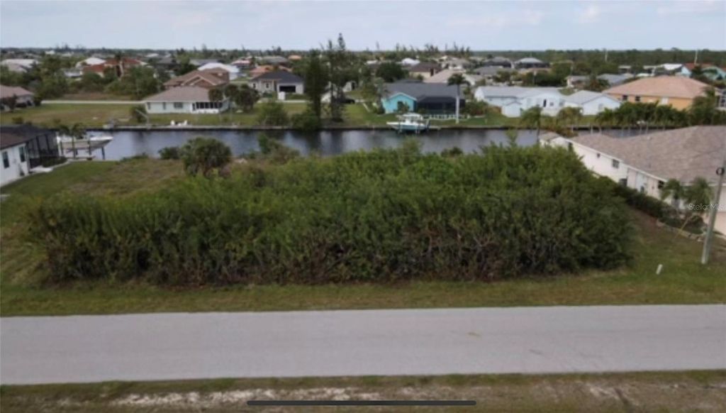 Photo of 15442 Mccomb Circle, Port Charlotte, FL 33981 (MLS # C7490188)