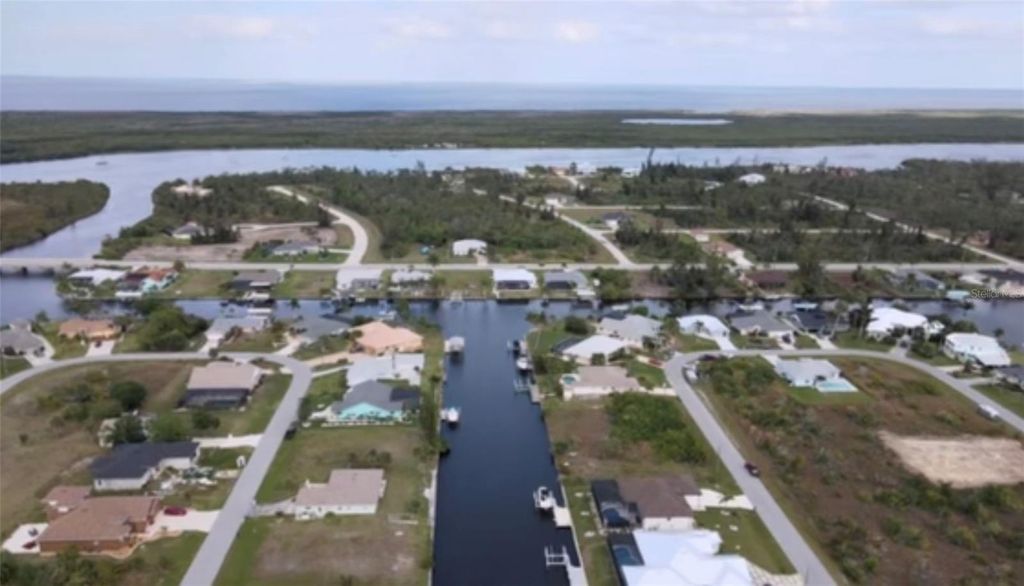 Photo of 15442 Mccomb Circle, Port Charlotte, FL 33981 (MLS # C7490188)