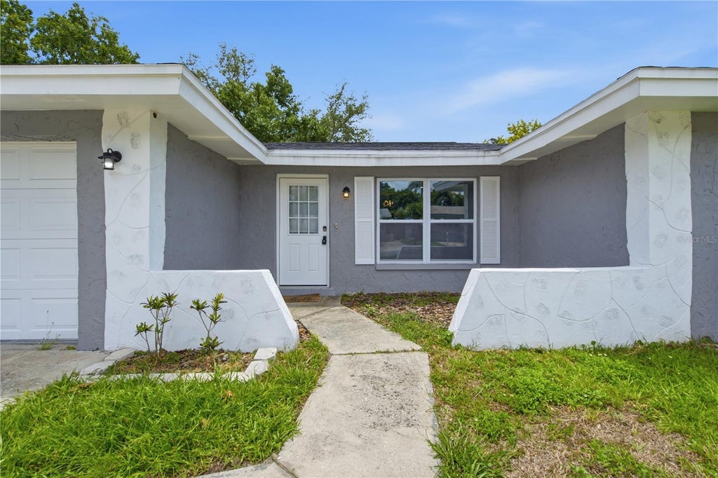 Photo of 1811 Forest Drive, Oldsmar, FL 34677 (MLS # TB8520312)