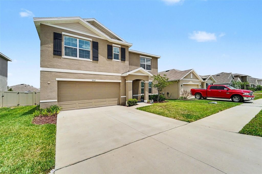 Photo of 33567 Hamilton Hill Lane, Wesley Chapel, FL 33545 (MLS # TB8507953)