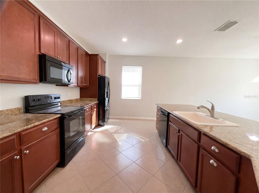 Photo of 10017 Weathers Loop, Clermont, FL 34711 (MLS # O6386767)