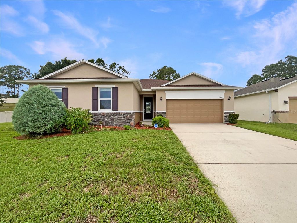 Photo of 10017 Weathers Loop, Clermont, FL 34711 (MLS # O6386767)