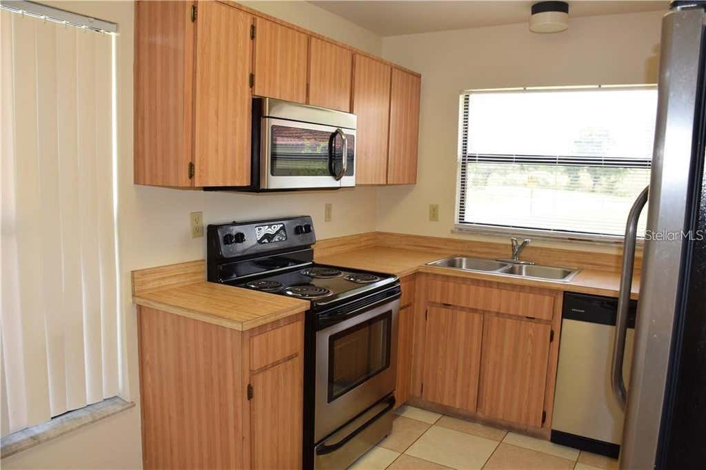 Photo of 470 Hunter Circle, Kissimmee, FL 34758 (MLS # O6421409)