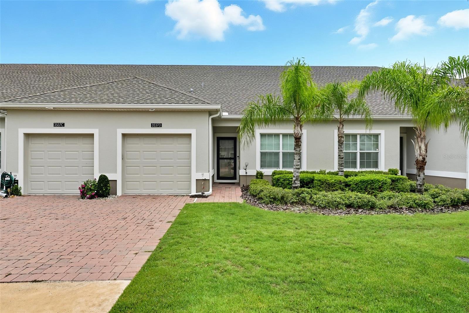 Nestled within the vibrant 55+ gated community of Heritage Hills in Clermont, this delightful St. Lucia Villa offers approximately 1374 square feet of thoughtfully designed living space. Constructed in 2018, the home features 2 bedroom, 2 bathrooms and a versatile flex room- an ideal space for an office or a private retreat,
Step into a bright and efficient kitchen with stainless steel/GE appliances, quartz countertops and ample cabinetry for modern convenience. The open floor plan flows seamlessly into a screened lanai, where you can savor peaceful mornings under the warm Florida sun.
Brand new flooring graces the newly painted home, while cozy new carpeted bedrooms and smart home features enhance comfort and functionality.
Additional garage storage, pantry space and plantation shutters add polished touches throughout including new light fixtures and fans in all bedrooms and lanai.
Beyond the doorstep, enjoy and array of resort caliber amenities; a pool and spa, courts for tennis, shuffleboard, bocce, horseshoes, a fitness center, arts and crafts studio, billiards, card room, ballroom and walking trails. With a convenience of lawn care, an on-site concierge
and secure gated access, this home embodies active, maintenance-free living in a serene setting.