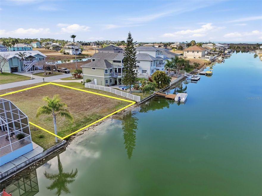 Build your dream waterfront retreat at 3505 Triggerfish Drive in Hernando Beach and wake up every day to breathtaking sunset views over the water. This buildable waterfront lot offers the perfect canvas for a custom home designed to embrace Florida’s coastal lifestyle.
Located in a golf cart–friendly waterfront community, you’ll love cruising to nearby restaurants, shops, and local favorites, all while enjoying the laid-back charm Hernando Beach is known for. With convenient access to Tampa via the Suncoast Parkway and Orlando via Highway 50, you get the best of peaceful coastal living without sacrificing connectivity. This deed-restricted community features a low annual HOA of just $330 and offers community boat lift access to the Gulf of America, making it easy to spend your days boating, fishing, and soaking up the Salt Life. Whether you’re envisioning sunset dinners on the water or weekend adventures on the Gulf, this lot delivers the lifestyle you’ve been waiting for. Welcome home to waterfront living, Florida-style.