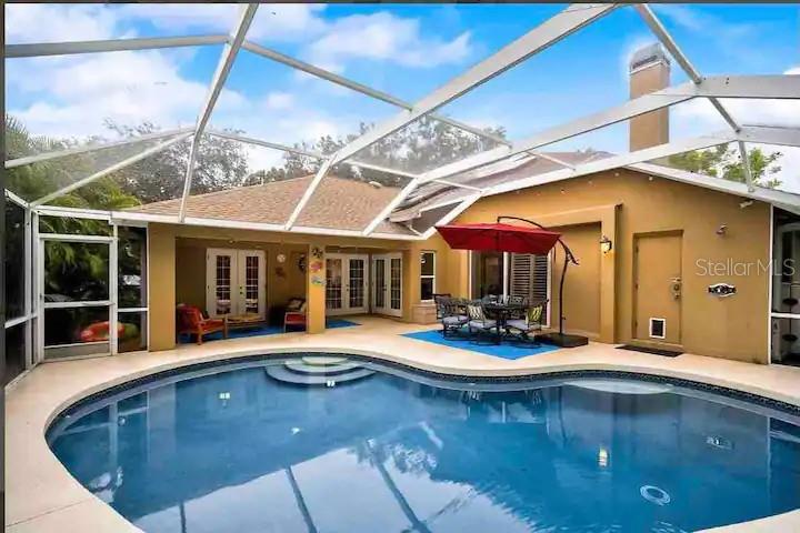 Welcome to a Coastal living vibe in the heart of Sarasota. A great family vacation home, a short drive & minutes from all the beaches: Siesta Key, Lido Key, Bradenton Beach, and Ana Maria Beach.
This newly remodeled home is perfect for families and is located in a peaceful, quiet, and family neighborhood. The home features a private screened area with a heated pool, a spacious kitchen, 2 living rooms, dining area, and many more amenities.
Pack your bags, the perfect vacation is just a click away! This 4-bedroom, 3-bathroom vacation rental is perfect for a group looking for fun in the Florida sun! Boasting a large heated private pool, backyard oasis, this house is the ideal space for your group to kick back and enter into a vacation state of mind. White sand beaches are just a stone's throw away when you are craving the crashing waves and warm Gulf breezes. This home will not disappoint!
Create a tradition with your entire family or group of friends when you visit this gorgeous home, featuring a large pool and tiki bar - you’ll want to come back year after year!
Bedroom 1: California King Bed |
Bedroom 2: Queen Bed |
Bedroom 3: 2 Full Beds |
Bedroom 4: 1 Full size bunk bed & 1 Twin bunk bed w/ trundle |
Living Room: 2 couches |
Family Room: couch & 2 lounge chairs
OUTDOOR LIVING: Screened-in patio w/ seating, gas grill, lake, yard space, custom furniture, extremely private lanai with palm trees
INDOOR LIVING: Smart TVs, home theater set-up, fireplace, dining table, ceiling fans, multiple living rooms, clawfoot tub