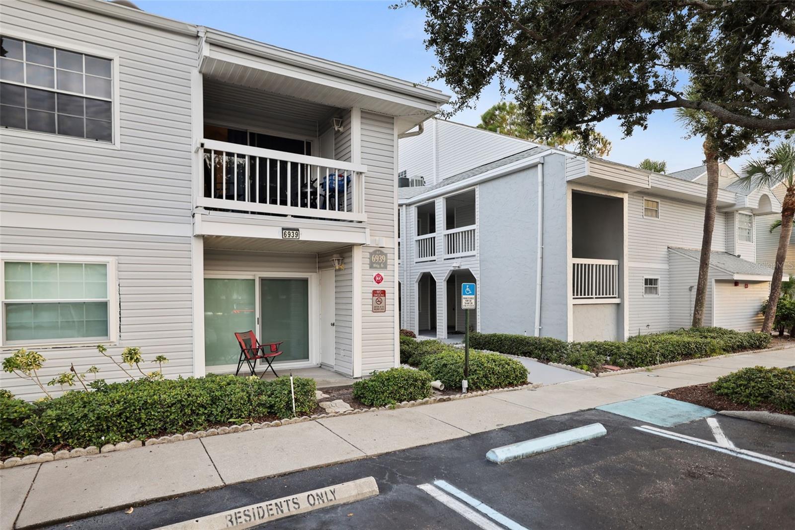 Welcome to this beautifully updated TOP FLOOR CORNER UNIT condo that perfectly blends comfort, style, and convenience. This 1-bedroom, 1-bathroom home features SOARING CEILINGS and a SPACIOUS LOFT area that offers flexibility for a home office, guest space, or creative retreat. Step inside to find NEW laminate flooring and NEW carpet throughout, creating a modern yet cozy ambiance. The open-concept living and dining area is filled with natural light and flows effortlessly into the kitchen, making entertaining or relaxing at home a breeze. The high ceilings in the dining and living room add a grand, airy feel that truly sets this unit apart. Enjoy your morning coffee or evening sunset on the private front balcony, an ideal spot to enjoy Florida’s sunshine year-round. The in-unit laundry has been thoughtfully upgraded with a brand-new washer and dryer, making everyday chores simple and efficient. The spacious bedroom features generous closet space, and the full bathroom offers comfort and functionality. Upstairs, the loft adds valuable bonus space and overlooks the living area, further enhancing the open and inviting layout. Located just minutes from Tyrone Mall and Pinellas Trail, this condo provides easy access to shopping, dining, recreation, and entertainment. Plus, you are only a short drive from the stunning Gulf beaches — perfect for weekend getaways or daily sunset strolls. The monthly HOA fee COVERS: water, cable, and WiFi, as well as access to community amenities including a sparkling pool and well-maintained tennis courts. This pet-friendly community welcomes your furry companions, making it easy to feel right at home. Whether you’re a first-time buyer, snowbird, or investor, this condo offers an exceptional opportunity to enjoy low-maintenance living in a prime location. Don’t miss your chance to own this stylish and well-maintained home — schedule your private showing today!