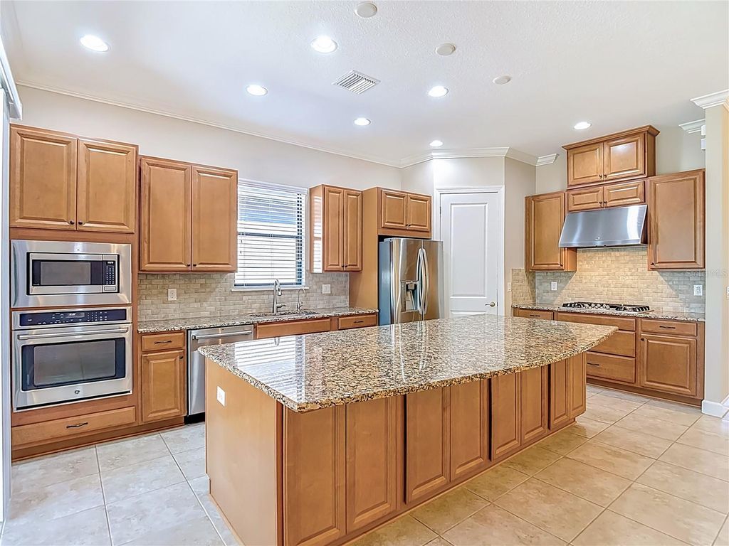 Photo of 8613 Grand Alberato Road, Tampa, FL 33647 (MLS # TB8470209)