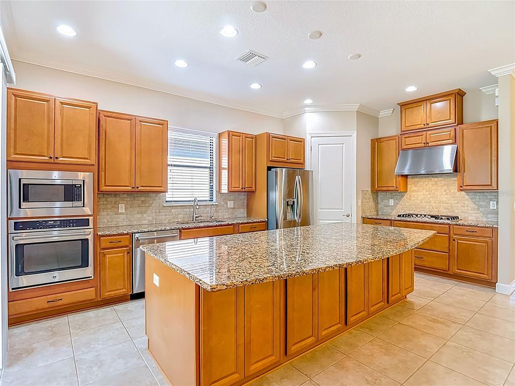 Photo of 8613 Grand Alberato Road, Tampa, FL 33647 (MLS # TB8470209)