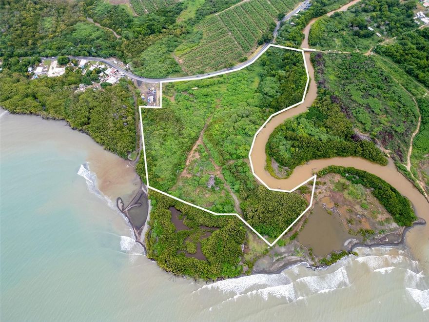 Located in Pueblo Ward, Salinas, this oceanfront parcel presents a unique opportunity along Puerto Rico’s southern coast. With a total land area of 12 cuerdas (approximately 47,164.68 m² / 11.65 acres), the property offers over 410 sqm of direct Caribbean Sea frontage and a natural marina, making it an ideal canvas for a tourism-oriented commercial project. Its flat and well-drained topography provides excellent conditions for large-scale developments such as a boutique hotel, eco resort, or mixed-use waterfront concept. The site enjoys quick access to PR-1 Km 92.0 and the PR-52 Luis A. Ferré Expressway, connecting easily to major urban centers while preserving a calm coastal setting.
Currently zoned SREP-AP (Suelo Rústico Especialmente Protegido – Agrícola Productivo), the parcel’s appraised value reflects the extraordinary assumption of rezoning to an Área Desarrollada or comparable category, unlocking future commercial potential. Supported by municipal endorsement for a prior hotel initiative, this land stands as one of the few remaining oceanfront tracts in Salinas with genuine development viability. Utilities such as electricity, water, and telecommunications are available nearby. The property lies within Flood Zones AE (0.82 of the total) and VE (0.18 of the total), where mitigation measures are recommended.
CRIM: $499 annually.