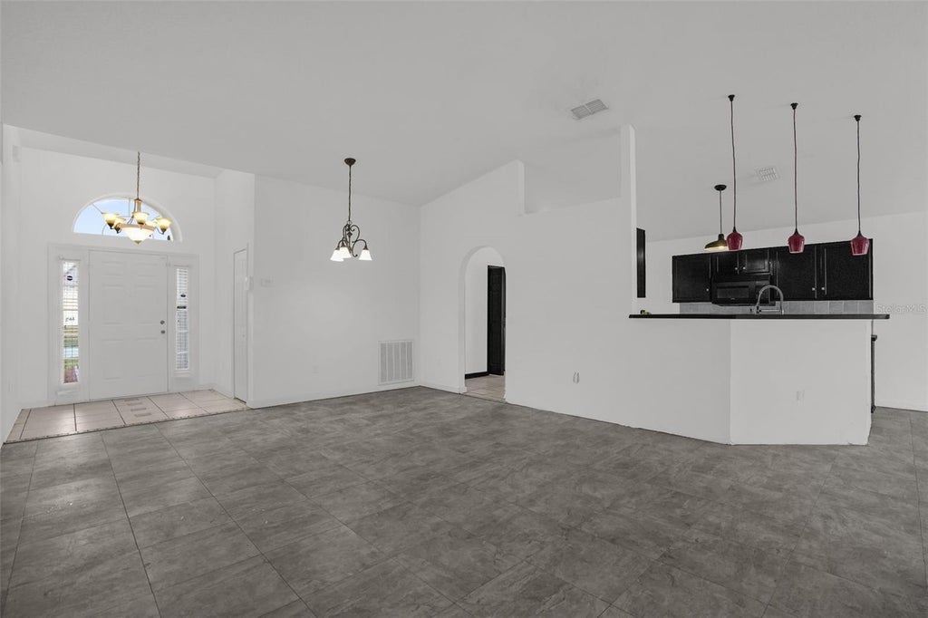 Photo of 2013 Honeybell Avenue, Haines City, FL 33844 (MLS # S5157171)
