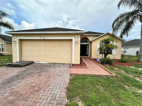 Photo of 2013 Honeybell Avenue, Haines City, FL 33844 (MLS # S5157171)
