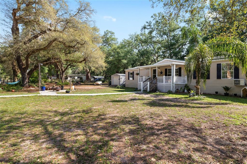 Photo of 8742 Brazil St, Zephyrhills, FL 33540 (MLS # TB8471223)